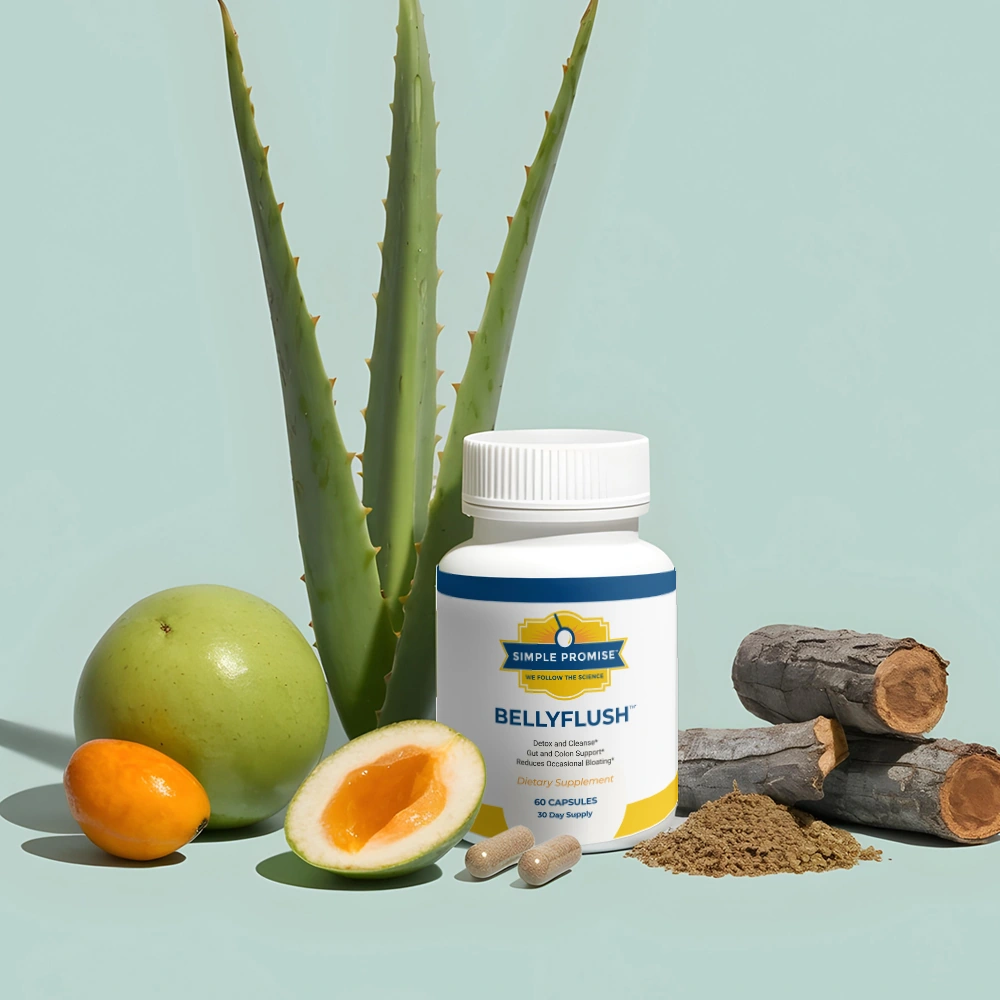 A BellyFlush bottle photographed with aloe leaves, triphala fruit, licorice root and loose capsules